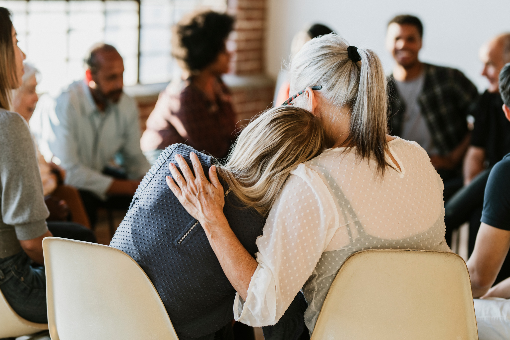 rehabilitation from alcoholism and drug addiction with a happy group of people getting help